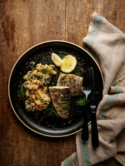 Crispy trout with cheese white beans and cavolo nero