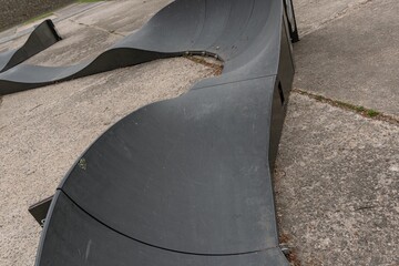 Dark black carbon plastic bikepark bike pump track park skatepark ramp tube pre precast modular...