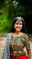 Beautiful Indian woman in traditional chaniya choli for navratri. Navratri is an Indian Festival...