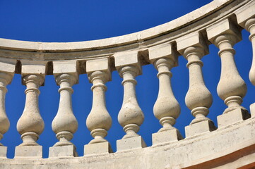 White balusters. A fragment of classical architecture.