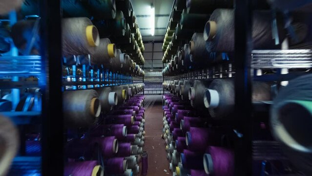 Carpet factory, carpet production, synthetic yarns for weaving loom. 4K . 2