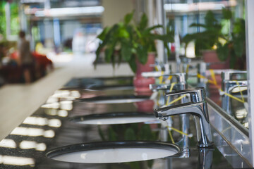 Stainless steel faucets and sinks