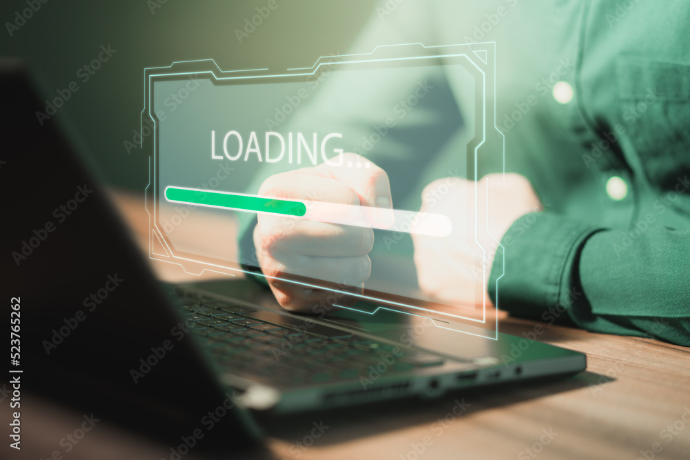 Poster Man using laptop for download and waiting to loading digital business data form website, concept of waiting for load of loading bar.
