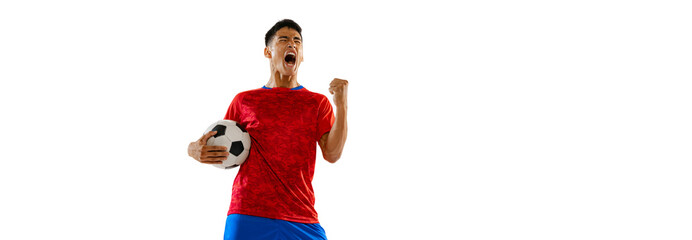 Portrait of young expressive man, football player posing isolated over white studio background....