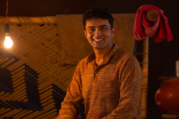 Portrait of happy man looking at camera
