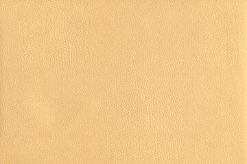 Black bright macro photo of texture of the genuine faux vegan leather. Fashion pattern and background. Leather with embossing.