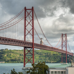 Famous 25 de Abril Bridge in Lisbon, Portugal.