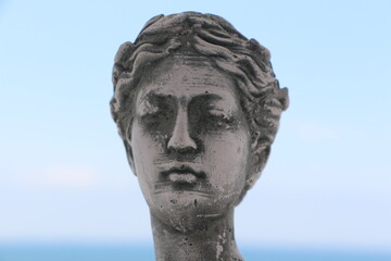 Fototapeta na wymiar Antique Style Cement Female Head Bust Statue