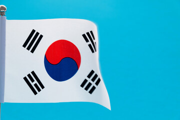 South Korean flag waving on blue background