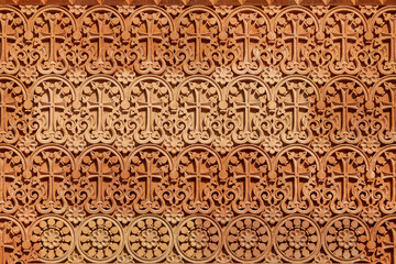 Background image - carved pattern on the wall of the Armenian church