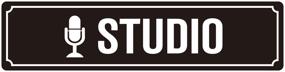 A sign that says : studio. Door sign