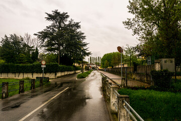 Fototapeta na wymiar View of a street at Meolo Town, Veneto, Italy.