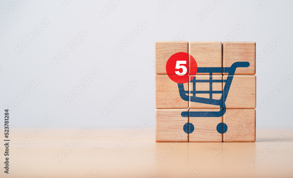 Poster notification number on shopping trolley cart icon print screen on wooden cube block for alarming of 