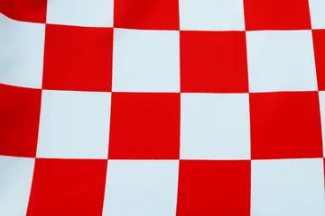 Foto op Canvas Background of red checkered flag © xy