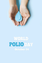 World Polio day. October 24. A blue drop in the hands of a child is a symbol of the Polio vaccine....