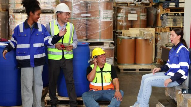 tea break relax time.Group warehouse worker people discussion talking together at warehouse factory workplace. Relax. Professional engineering teamwork.