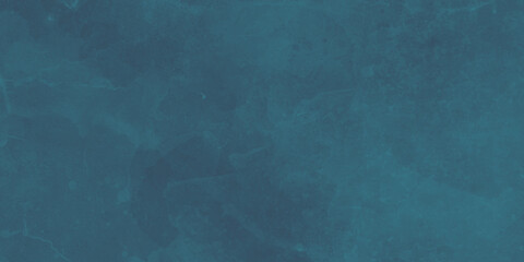 Beautiful grunge navy blue stucco wall background. Panoramic abstract decorative dark background. Wide angle rough stylized texture wallpaper with copy space for design.