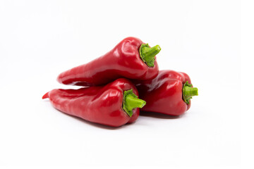 Red Peppers isolated on white. Capia or chili red peppers on white background.