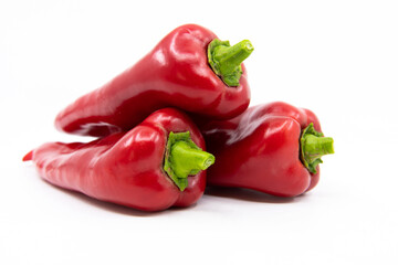 Red Peppers isolated on white. Capia or chili red peppers on white background.
