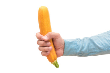 Yellow zucchini in human hand isolated on white background. Organic products. The concept of cooking