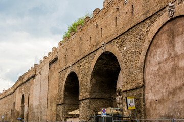 Roman stone wall near the Vatican and Saint Angel Castle, at Rome City, Italy.