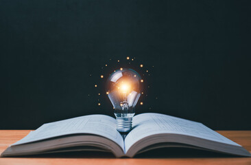 Light bulbs show ideas from opening a book, discovering new ideas. simulate new concepts Concepts...