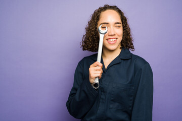 Portrait of a young woman feeling happy working as a female mechanic