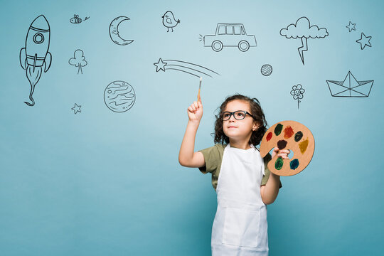 Talented kid dreaming of becoming a famous painter artist