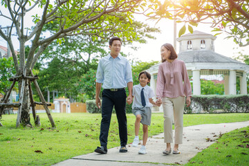 Family with children walking together in nature at park,Happy family relationship concept