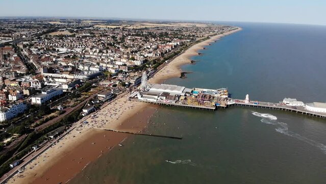 Aerial view of a ski-jet in the water next to Clacton-on-Sea pier