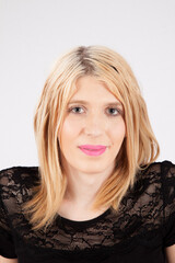Fototapeta premium Pretty Blond with a pleasing smile
