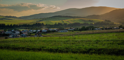 Obraz premium Summer sunny beautiful evening near Oravska Polhora village in Slovakia