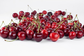 Sweet cherry. Lots of cherries on a white background.