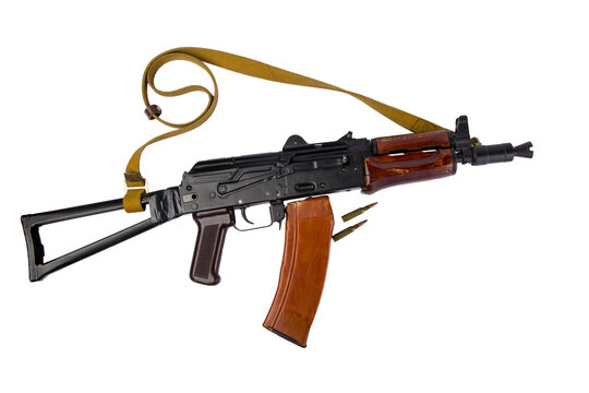 kalashnikov rifle with ammunition on white background
