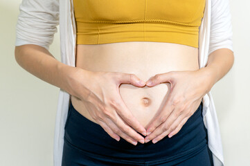 Pregnant woman, Backache during pregnancy. Pregnant woman suffering from lower back pain
