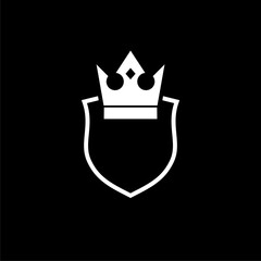 Shield and crown logo isolated on dark background