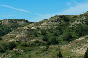 Naklejka premium Multi colored and layered rock hills at Theodore Roosevelt National Park