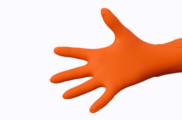 Orange rubber glove on hand on white background