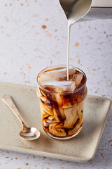 Iced coffee on terrazo