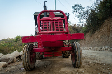 April 2nd 2022. Dehradun uttarakhand India. A closeup frontal shot of a red tractor vehicle.