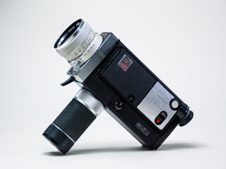 Vintage super 8 mm camera with white background