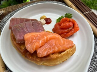 Salmon and tuna waffle with smoked salmon