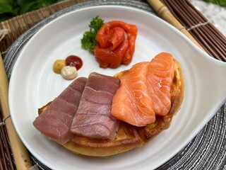 Salmon and tuna waffle with smoked salmon
