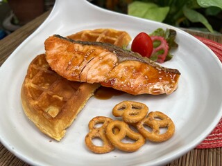 Salmon waffle sandwiches and mini pretzel and salad