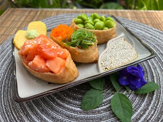 Salmon, seaweed and green bean tofu sushi