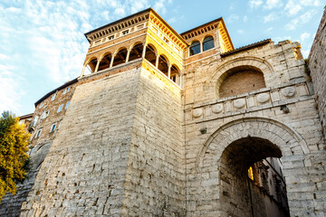 Fototapeta premium The Etruscan Arch or Arch of Augustus or Augustus Gate (with Augusta Perusia written on the facade) is a gate in the Etruscan wall of Perusia, known today as Perugia in Umbria, Italy, Europe.