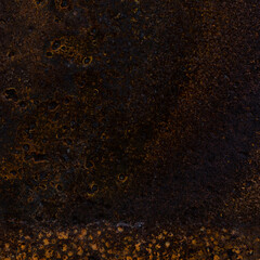 Old textured rusty coloured background. 