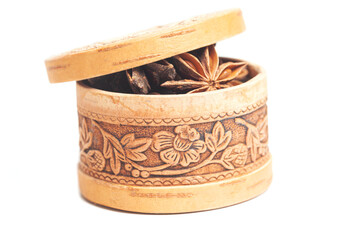 Anise in a wooden box Dried star anise spice fruits