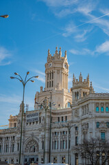 Fototapeta premium castle and clock tower in madrid spain europe