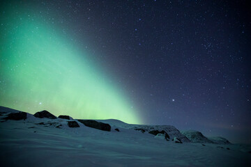 Northern lights in Reinheim Cabin, Dovrefjell National Park, Norway